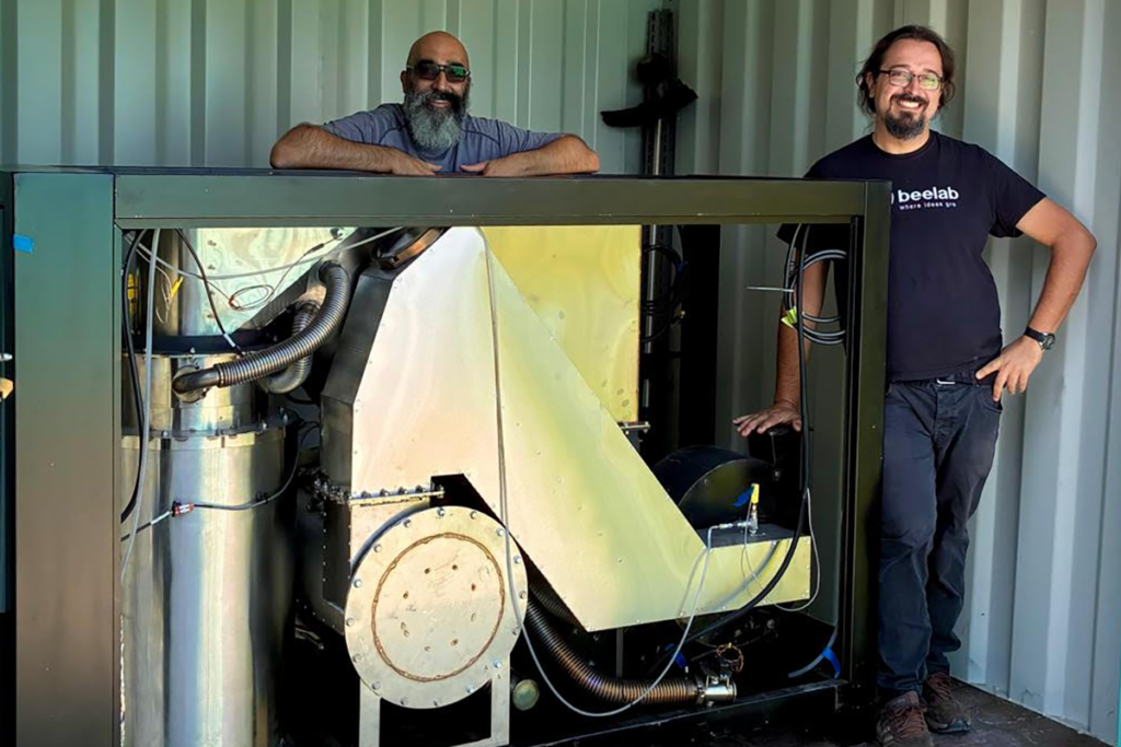 CharPallet in container with two researchers